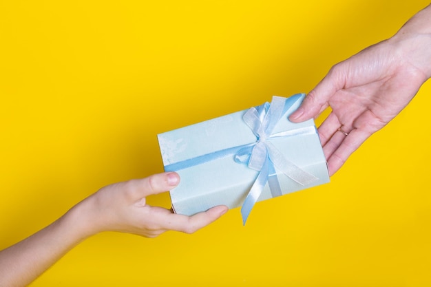 Gift is given to the recipient on a yellow background