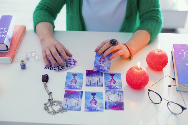 Gift of magic. Top view of a fortune tellers workplace with tarot cards on it