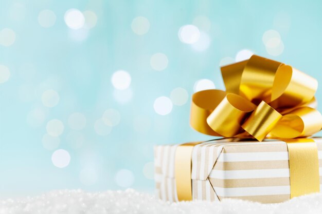 Photo gift or present box on magic bokeh background holiday composition for christmas or new year