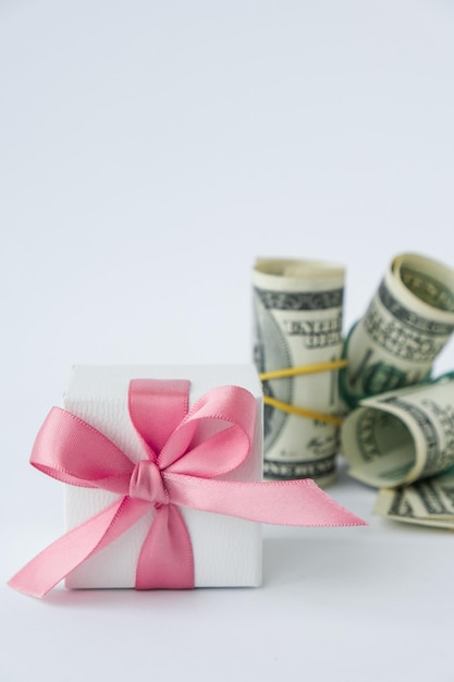 Photo gift present with money dollar buying gifts for holidays online shopping concept holiday sale