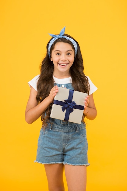 Gift she expected small girl customer open gift happy holiday celebration birthday party surprise shopping online delivery cheerful kid open wrapped box best resent ever