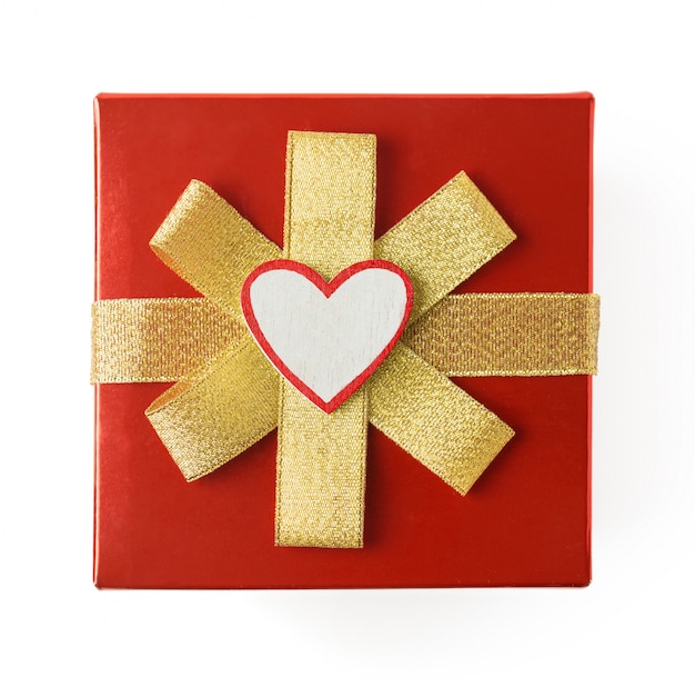 Gift for Valentine's Day, wrapped in red wrapping paper with gold