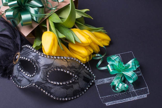 Gift and venetian mask