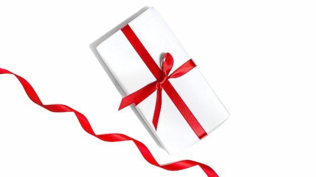 Gift with a red bow on a white background isolate banner