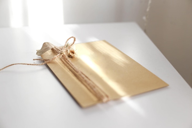 Gift wrap with envelope in white and beige colors