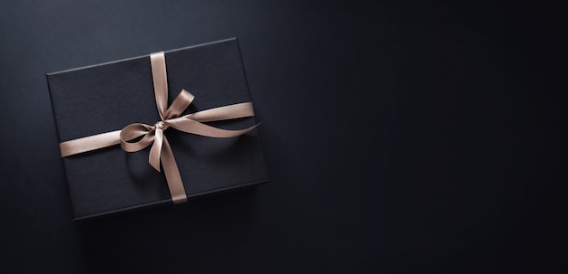 Gift wrapped in dark paper 