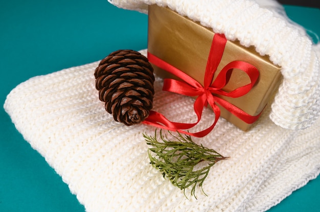 Gift wrapping and warm knitted fabric. High quality photo