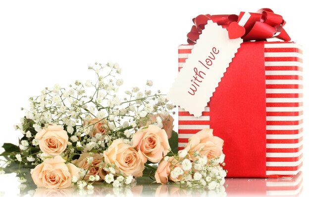 Giftbox and flowers isolated on white