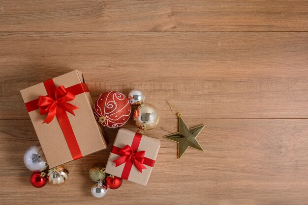 Gifts boxes with festive ribbons on wooden background