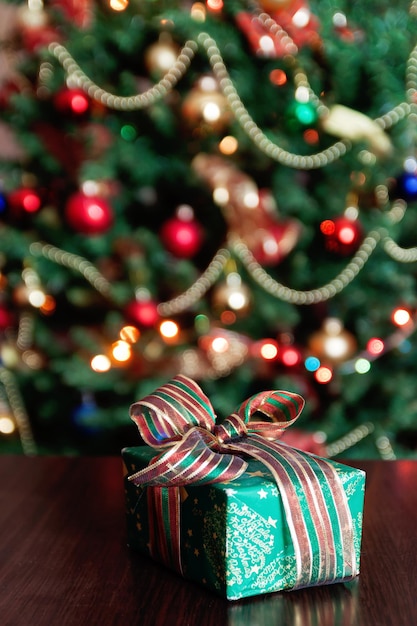 Gifts under the Christmas tree lights background