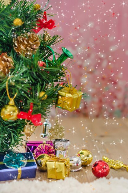 gifts with christmas tree on floor