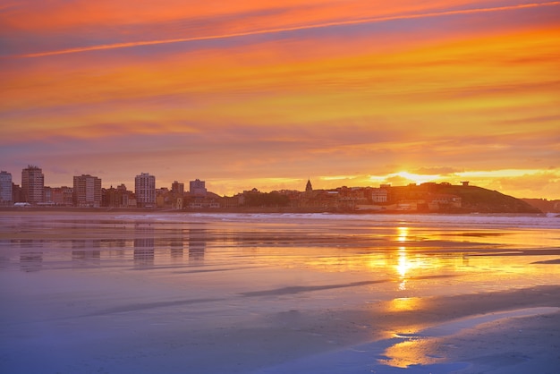 Gijon skyline sunset in San Lorenzo beach Asturias