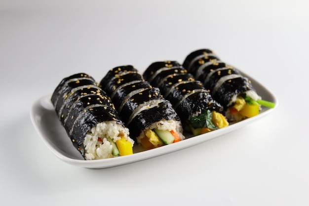 Gimbap or kimbap is a Korean food made from steamed white rice and various other ingredients