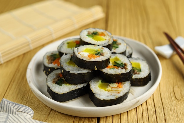 Gimbap or kimbap is a Korean food made from steamed white rice and various other ingredients