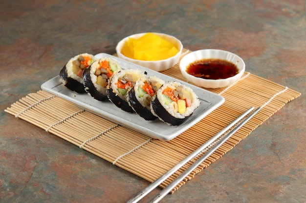 Gimbap or kimbap is a Korean food made from steamed white rice