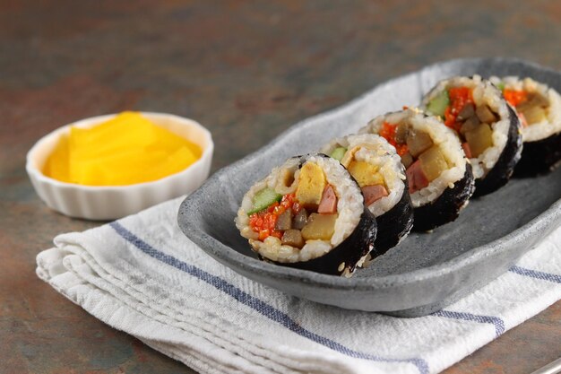 Gimbap or kimbap is a korean food made from steamed white rice