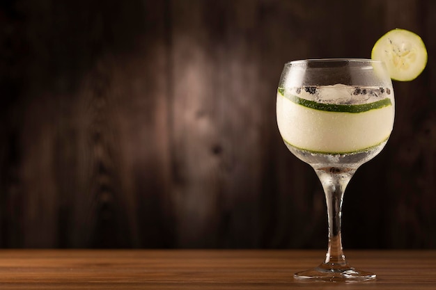 Gin Tonic garnished with cucumber