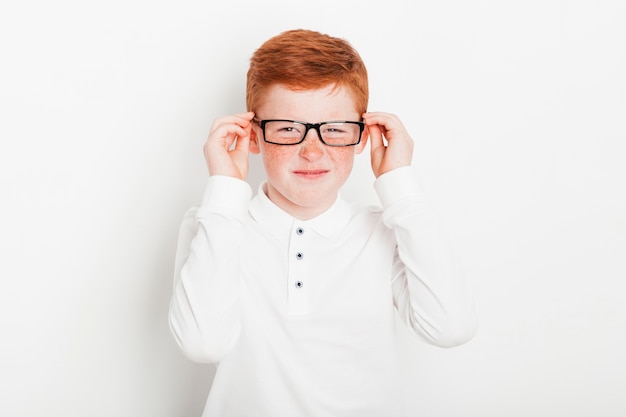 Photo ginger boy wearing black glasses