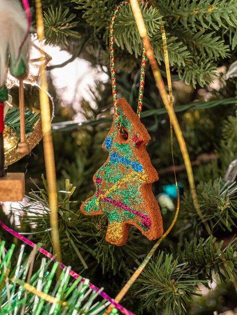 Ginger bread cookie tree decoration on christmas tree brench