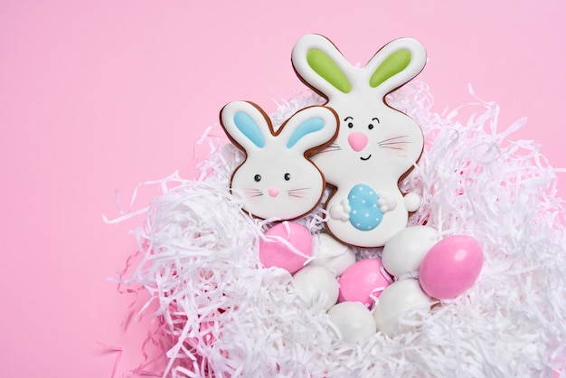 Ginger cookies and eggs in nest.