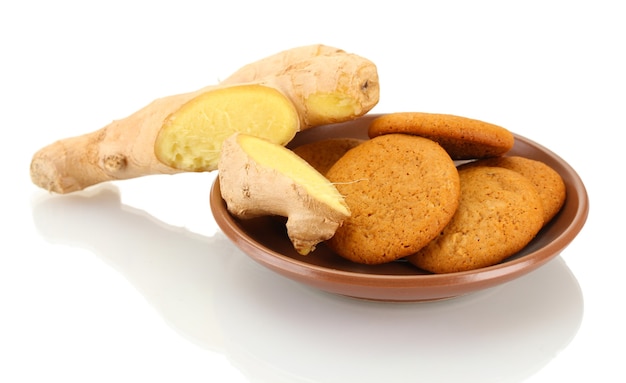 Ginger cookies with fresh ginger root isolated on white