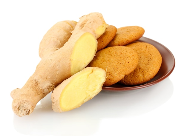 Ginger cookies with fresh ginger root isolated on white