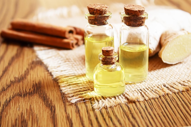 Ginger essential oil in a small bottle selective focusnature