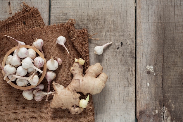 Ginger and garlic on wooden.