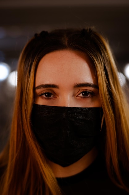 Ginger girl looking at camera with face mask