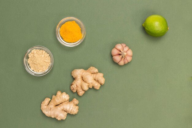 Photo ginger honey and turmeric garlic products for immunity alternative cold and flu remedy