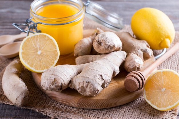 Ginger, lemon and honey on a cutting board