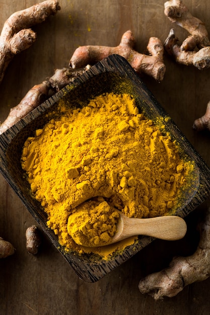 ginger powder on wooden table background