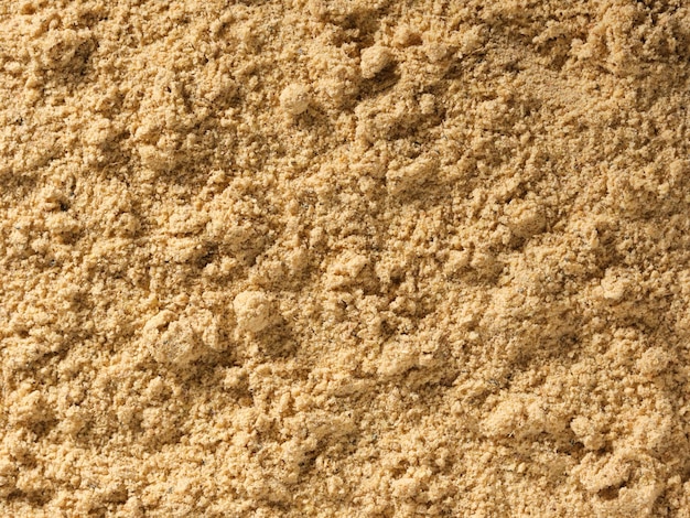 Ginger root powder condiment background used as a spice in cooking