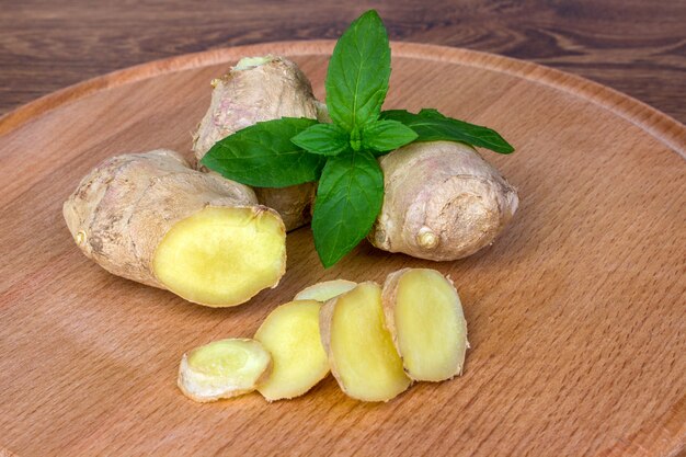 Ginger root with leaves of mint