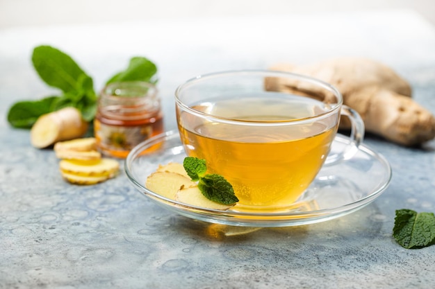 Ginger tea in a glass cup