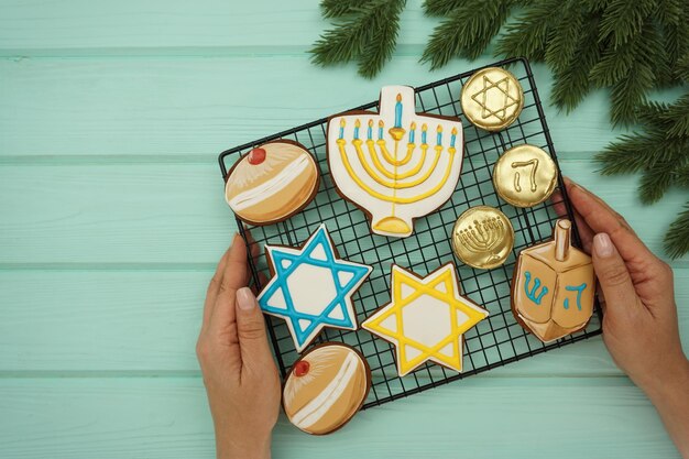 gingerbread cakes with symbols of the hanukkah holiday are laid out on the grill