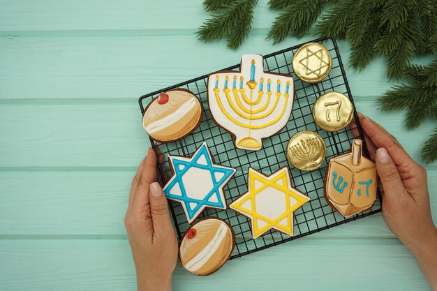 Gingerbread cakes with symbols of the Hanukkah holiday are laid out on the grill