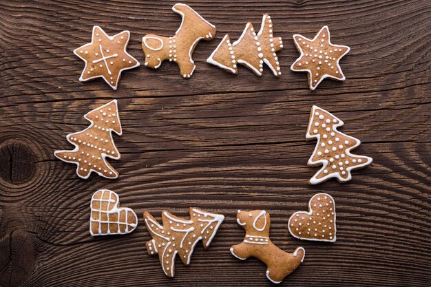 Gingerbread Christmas cookie background Christmas homemade gingerbread cookies on wooden background