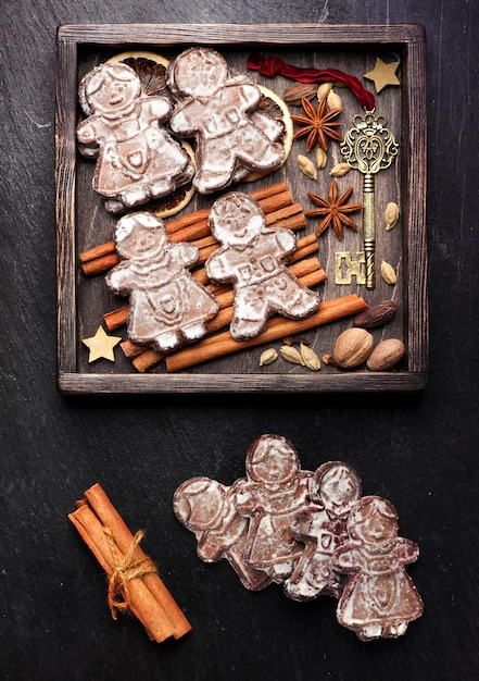 Gingerbread Christmas decorations and spices Christmas baking background