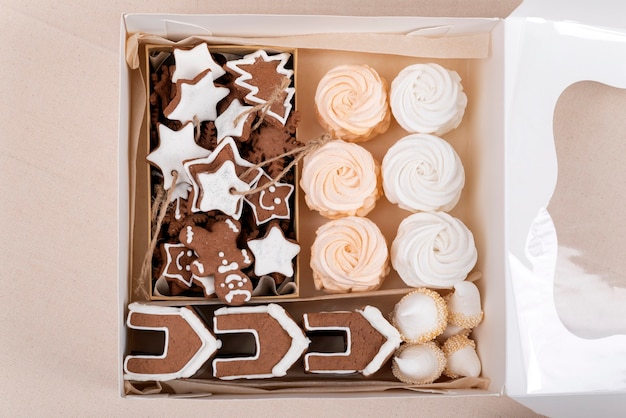 Gingerbread cookie and marshmallow top view. Sweets for New Year and Christmas.