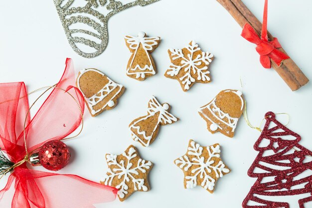 Gingerbread cookies and christmas decoration top view background