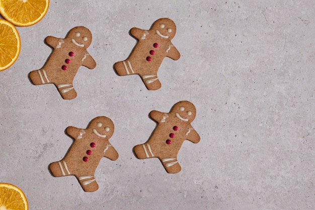 Gingerbread cookies on gray stone background copy space