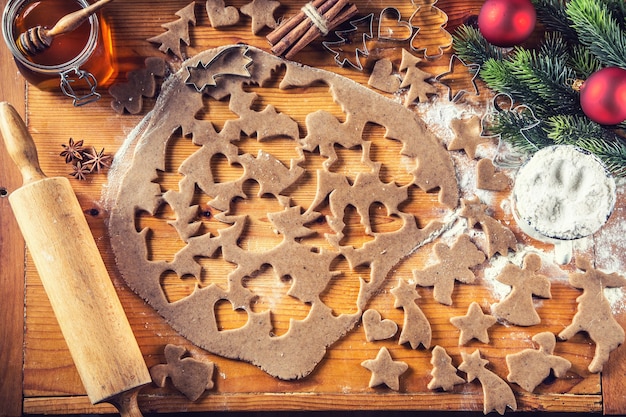 Gingerbread dough and preparing christmas biscuit cakes.