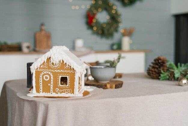 Gingerbread gingerbread house in the living room creates a festive mood christmas morning