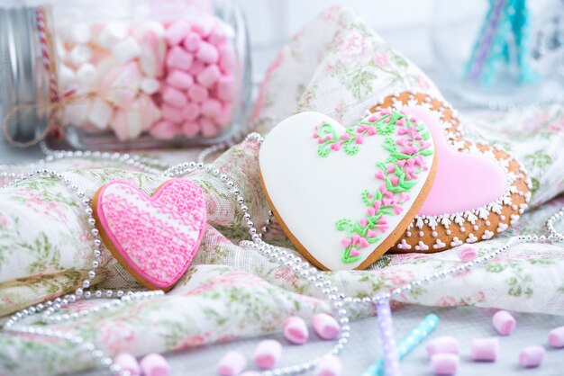 Gingerbread heart cookies on a fabric linen