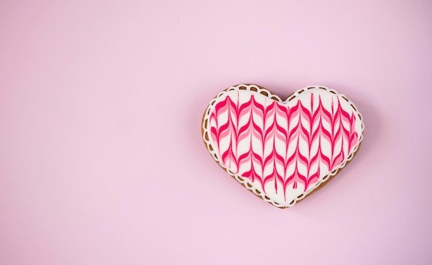 gingerbread heart on pink backgrounds love and romantic