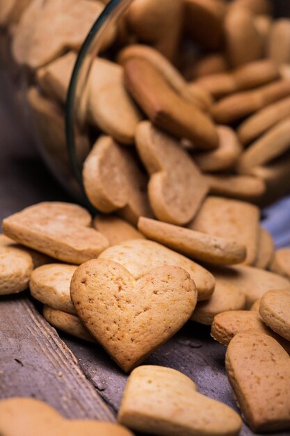 Gingerbread in heart shape in a glass jar