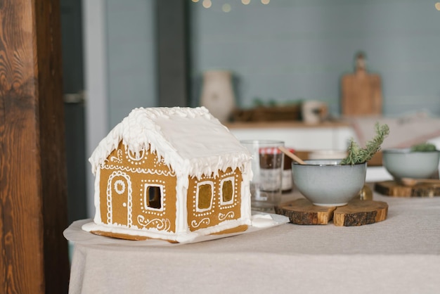 Gingerbread house on the christmas table with copy space