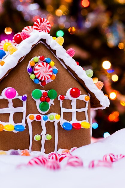 Gingerbread house with round  peppermint candies.