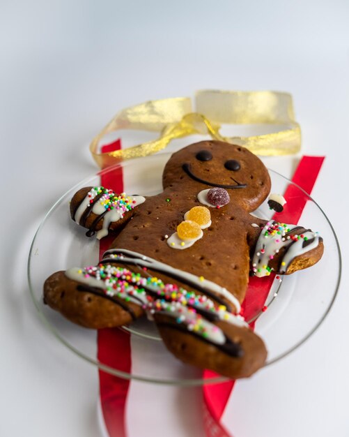 Gingerbread man and christmas decor on white background